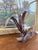 A dynamic and expressive mid-century brutalist sculpture depicting a spray of cattails and grasses, crafted from flame...
