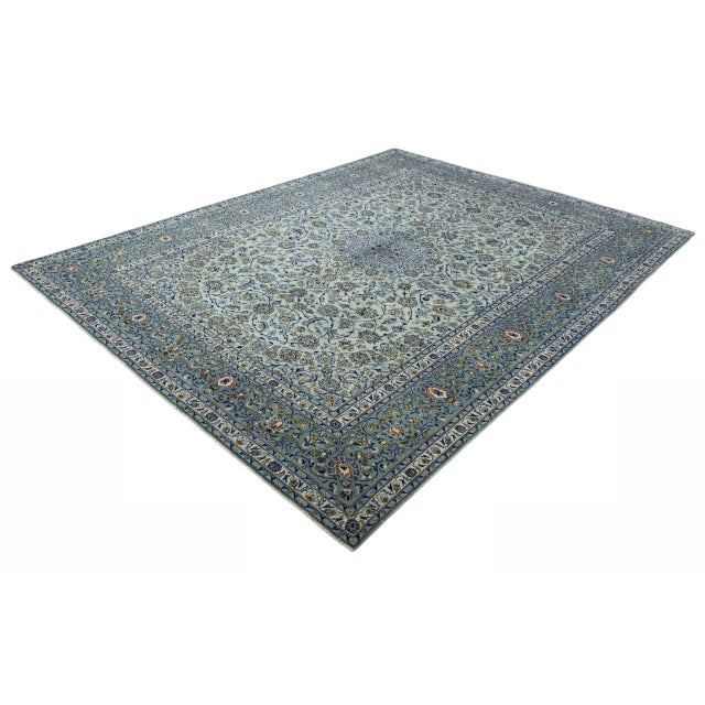This magnificent Kashan oriental rug impresses with a masterfully crafted design that combines classic elegance and...