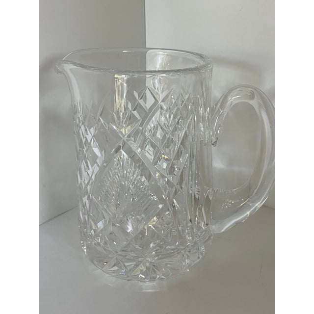 Beautiful! Very heavy! Lovely cuts and design. Owned by my mother who had a very large collection of Waterford. Feel it's...