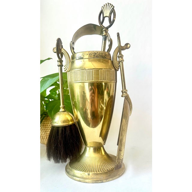 Charming and functional, this vintage Ianthe mini fireplace companion set is a perfect addition to your hearth or cozy...