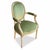 This is a pair of mid-century French Louis XVI style Berger chairs in a vintage green velvet. The medallion back is in a...