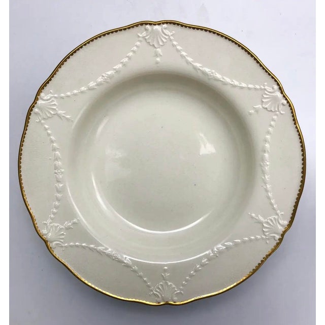 An elegant set of six large antique English ironstone bowls by Minton, dating to the late 19th century, circa 1870–1890....