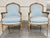 Pair of antique Louis XV bergère armchairs, originally handcrafted in the 19th Century from beech. They were later...