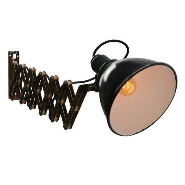 Work light. Brass scissor wall light. enamel shade diameter: 18 cm maximum length: 100 cm maximum length: 40 cm wall...