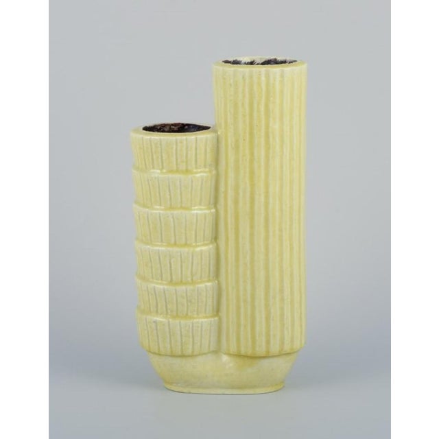 Gunnar Nylund (1904-1997) for Rörstrand, Sweden. Two-part ceramic vase in chamotte clay. Yellow/green glaze. Mid-20th...