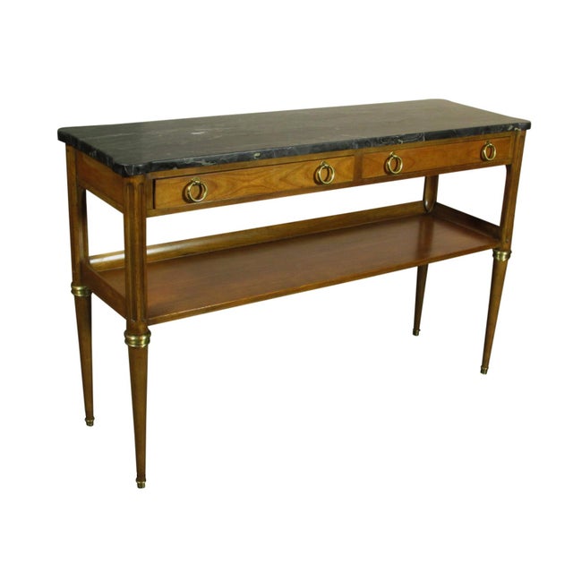 Neoclassical style black cherry console table by Baker. Features solid brass accents, dovetailed solid oak drawer...