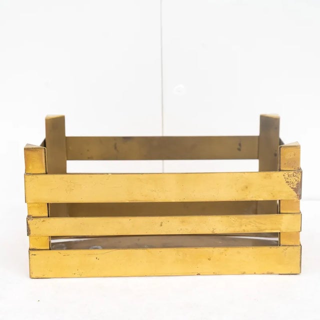 Brass box, Made in Italy, 1960s. Unique piece of sturdy brass holder, shaped like a typical fruit box. Its special feature...