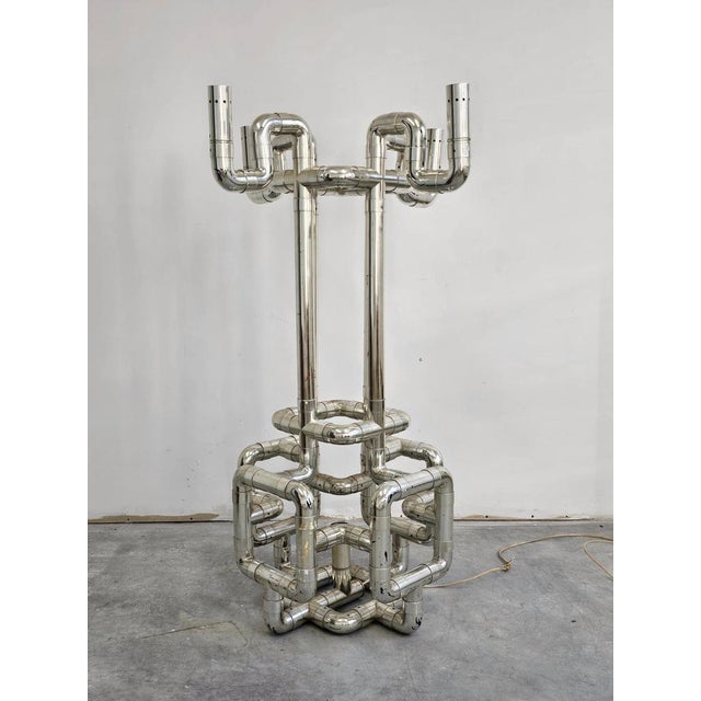 An exceptionally rare Space Age floor lamp, model "Rombo", designed by Gaetano Missaglia. The lamp is made on ABS tubes,...