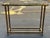 High quality aged brass picture frame console table with chamfered glass inset, manufactured in Italy for Mastercraft,...