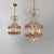 Italian Art Nouveau chandeliers in pink Murano glass and brass, early 1900s Pair of round-based drop chandeliers or...