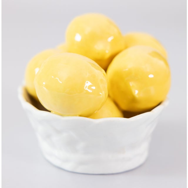 A lovely Mid-Century Italian majolica basket of lemons in a white latticework bowl. Marked "Made in Italy" on reverse....