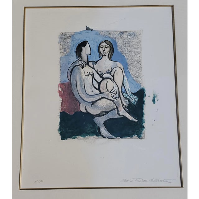 A framed color lithograph after Pablo Picasso's painting "Le Couple". This print is part of the Collection Marina Picasso,...
