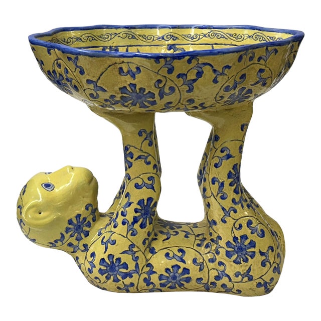 Vintage Oriental Yellow Base Color Blue Flower Monkey Holding Bowl Figure For Sale