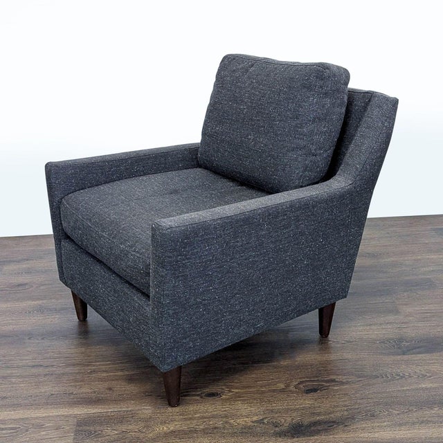 Features dark gray fabric upholstery and wood legs. Brand: West Elm. Original Price: $500. Dimensions (in): 32W x 33D x 29H.