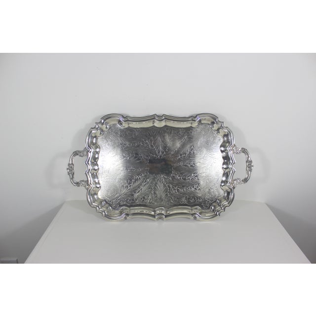 Extra large vintage rectangular silver plated tray with gorgeous scalloped edge and ornate handles and feet and an...