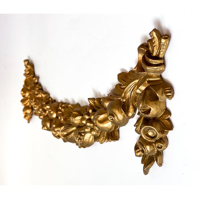 Spectacular wall swag in the form of fruits and greenery. Gold gilding gives it a lovely shine, and it is marked "Italy"...