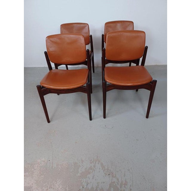 Four restored Erik Buch rosewood dining chairs custom reupholstery included This model that is only very rarely seen in...