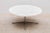 Round Carrara marble coffee table in style of Florence Knoll for Knoll. This design is an architectural classic with the...