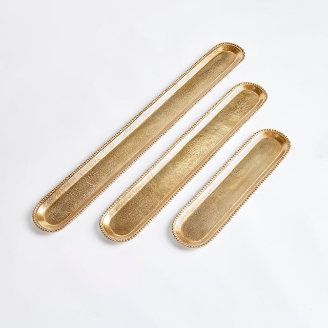 Talk about drama The longest tray in this set is 42 inches! Style with candles, foliage or natural orbs for a showstopping...