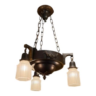 Circa 1920’s Dark Brozed Patina Chandelier With Ribbed Glass Shades For Sale