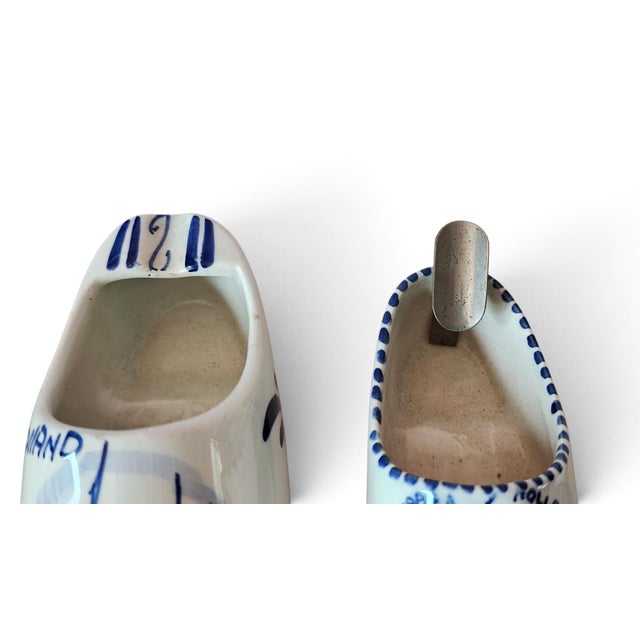 Misc collection of vintage Delft Pottery shoe shaped ashtrays, 5 different sizes with 5 different marks. All blue & white....