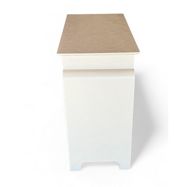 Textured cabinet with an Asian silhouette made by Gregory Strepsky of Sarasota will be a focal point of your hall or...