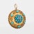 Distinct antique Victorian locket (circa 1880s to 1900s) crafted in 14 karat yellow gold. Turquoise cabochons measure from...