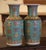 These elegant colorful Famille Rose vases were created in China circa 1950. Standing tall, the large vessels feature a...