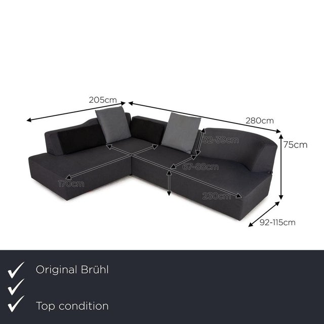 The Lady Bug Small sofa by Brühl is upholstered in gray fabric and extends to the floor. Its classic shape and timeless...