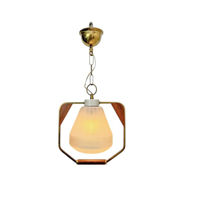 Mid-Century pendant lamp, Danish design, 1960s. What a stylish design! The fixture has an open frame construction with...