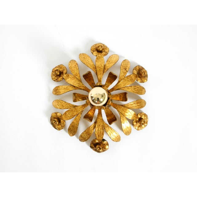 Beautiful, handcrafted gold-plated ceiling lamp from the 1960s. stunning brutalist-florentine design with intricate...