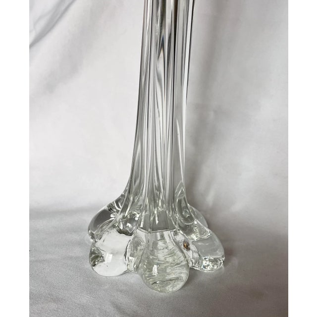 Whimsical and playful hand blown glass bud vase with an organic “blob” base and fluted neck.