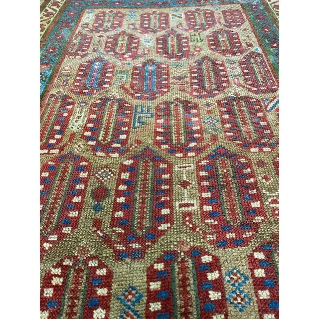 ACTUAL SIZE: 3’0″ x 15’6″ PRIMARY COLOR: Tan / Red AGE: Antique MATERIALS: Wool FOUNDATION: Cotton PRODUCTION: Handwoven,...