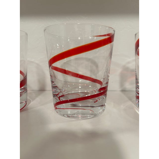“SWIRLINE" Red Double Old Fashioned, 4 1/4 tall. This set of 7 glasses are in excellent, pre-owned condition - no chips or...