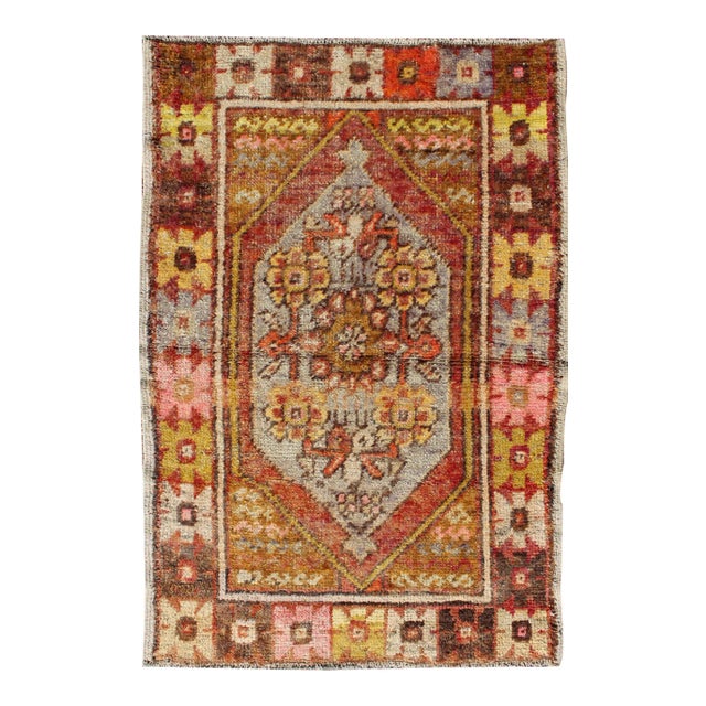 Colorful Vintage Turkish Small Oushak With Floral Medallion and Border For Sale