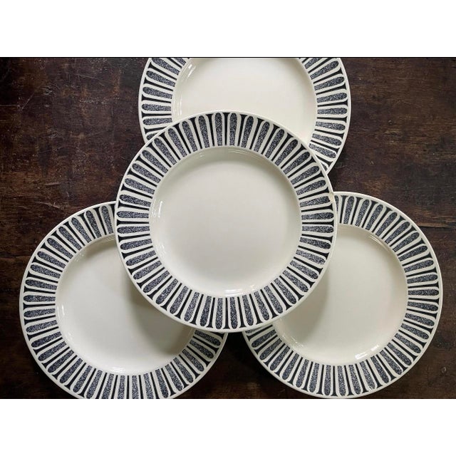 Fantastic set of mid-century dinner plates, this listing is for a set of four. These plates were designed by Paul McCobb....