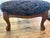 Charming antique French footstool featuring a beautifully carved hardwood frame with graceful cabriole legs, foliate and...