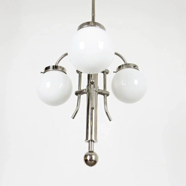 Glass & Steel Pendant Lamp, in Very Good conditions. Designed 1920 to 1949 European Plug (up to 250V).The wiring of this...