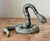 Embrace the allure of the exotic with this captivating vintage bronze snake sculpture, a truly distinctive decorative...