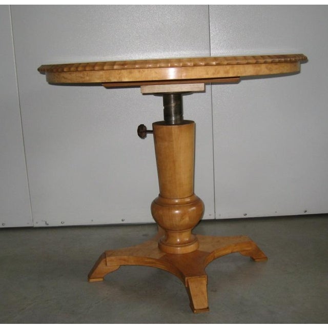 Antique round extendable table. Early 1900s Antique round extendable and height-adjustable table Early 1900s. Northern...