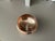 Darling old copper bowl with brass feet. Old copper (not marked) and lines with silver over copper which you can see is...
