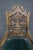 Highly carved throne chair in medieval design on Walnut frame