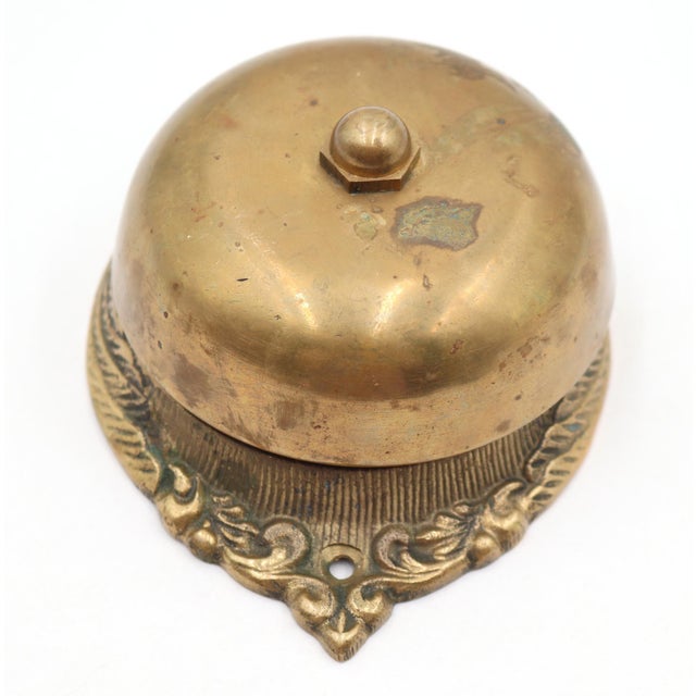 Antique Victorian style crank or mechanical twist brass door bell. The original mounting screws are not available. Good...