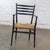Wonderful vintage Italian MCM a.k.a. Mid-Century Modern ladderback armchair composed of a black painted frame and a...