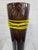 Contemporary art glass vase with wrapped yellow rope embellishment which adds texture and color pop. Dimensions: 16.5"H x...