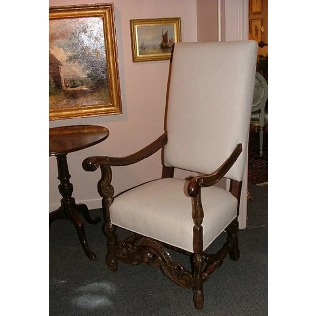 19th century English oak armchair upholstered in linen.