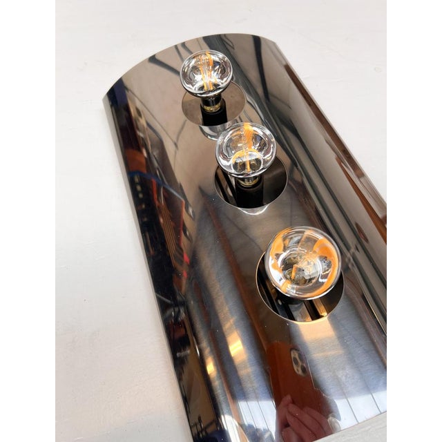 Unique 40 cm high steel designer wall lamp by Goffredo Reggiani for the famous Reggiani Illuminazione in Space Age style....