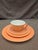 A stunning, highly collectible 16-piece "rainbow" pastel dinnerware service for four from the late 1930s to 1940s....