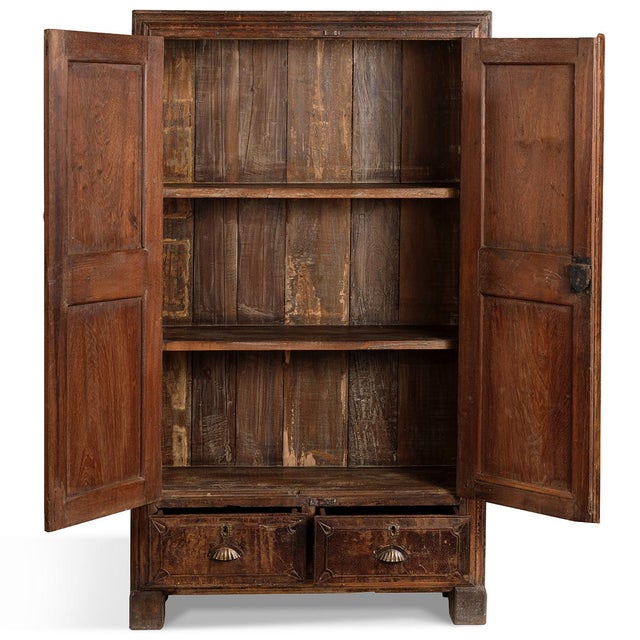 This exceptional Indian Almirah cabinet showcases authentic teak wood craftsmanship. The doors date from the mid 20th...