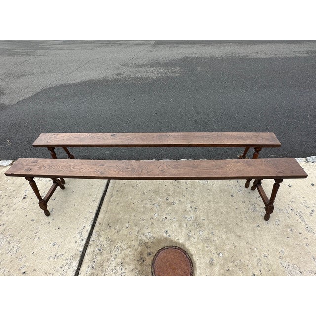 Incredible pair of English rustic antique very long hand crafted oak block benches. One is slightly smaller at 86. 25 L 13...